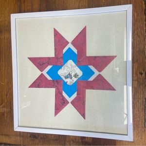 Framed hand folded paper oragami star art work decor folk 
Hang on wall or stand
